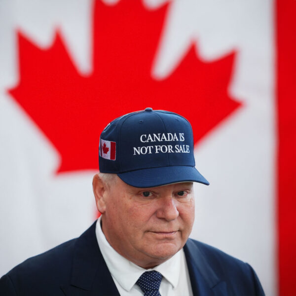 Doug Ford takes jab at Donald Trump with 'Canada is not for sale' hat