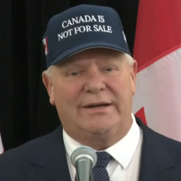 Ford sports "Canada not for sale" hat at first ministers meeting with Trudeau