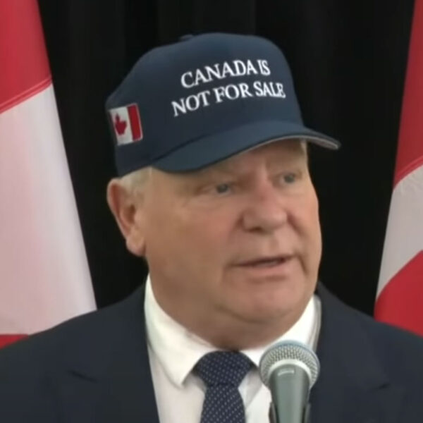 Ford sports "Canada not for sale" hat at first ministers meeting with Trudeau