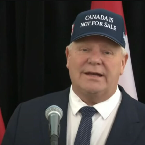 Ford sports "Canada not for sale" hat at first ministers meeting with Trudeau